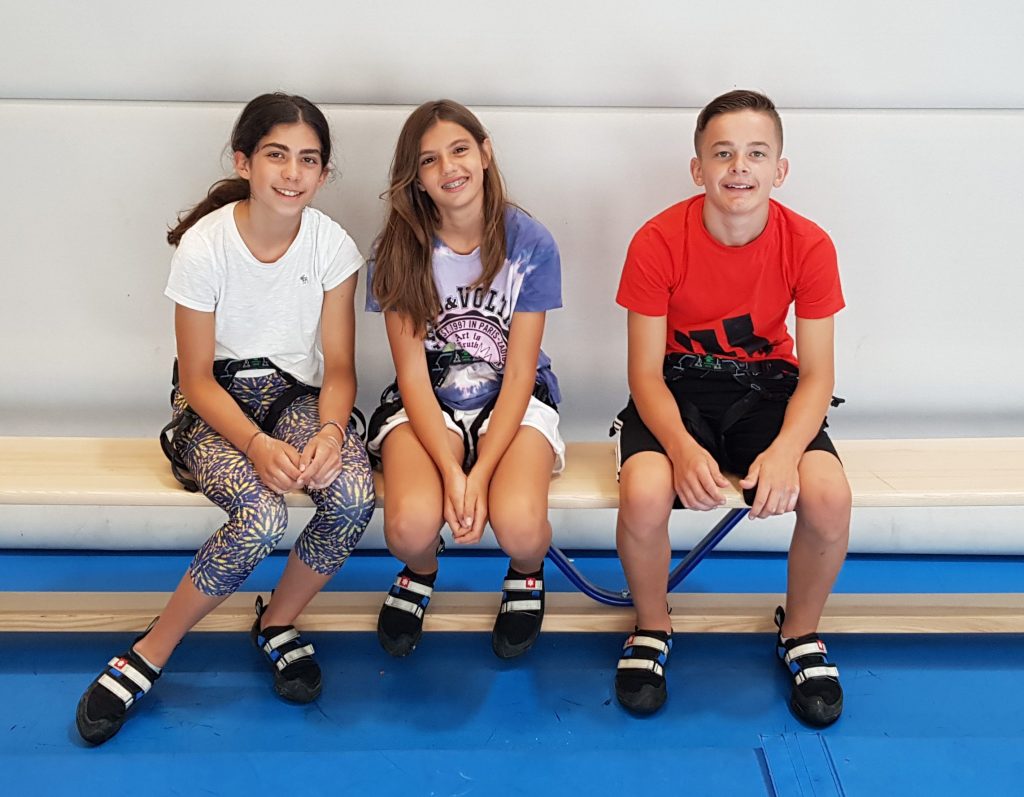 Altitude Summer Camps - three kids getting ready to climb