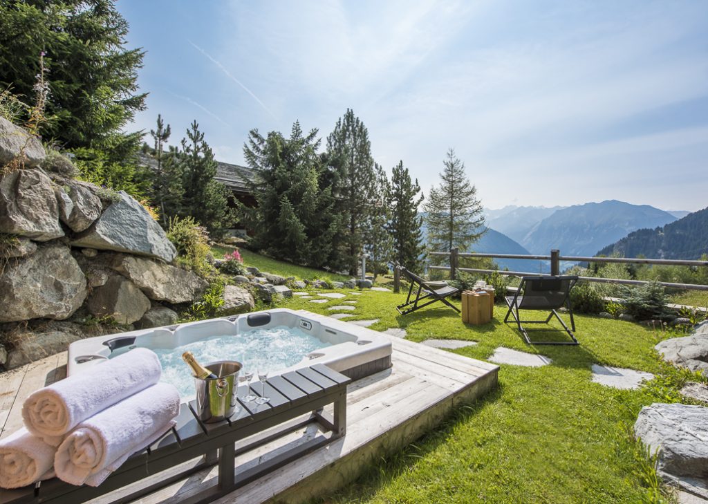Altitude Family Camps - outdoors of a family chalet with a hot tub