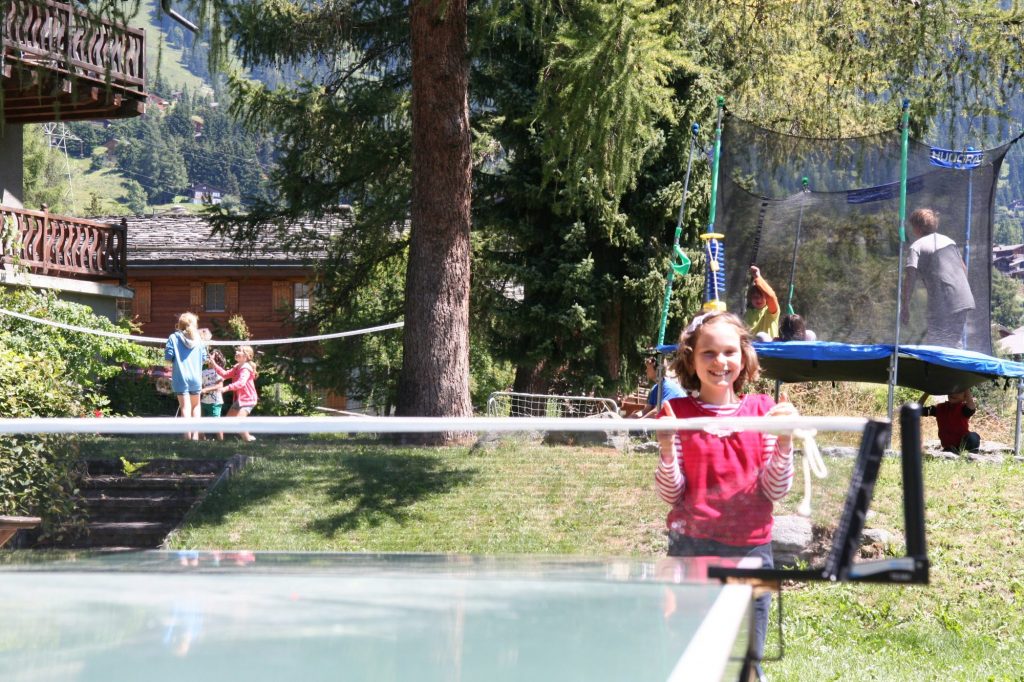 Altitude Residential Camps - girl playing table tennis in the garden