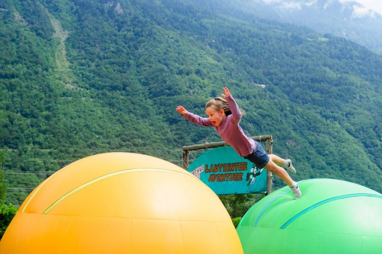 Excursions in Switzerland - girl jumping on bouncy balls