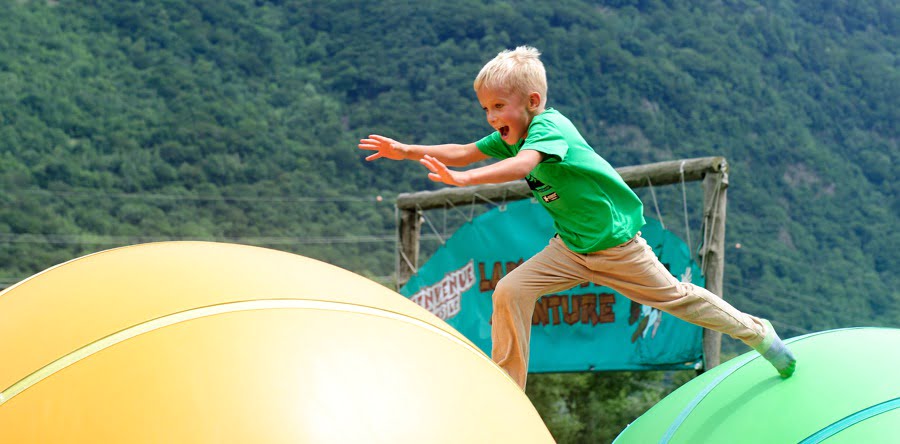 Excursions in Switzerland - boy jumping on bouncy balls