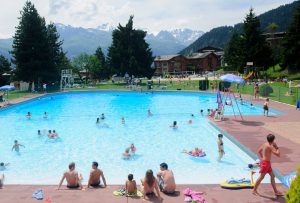Residential camps - swimming pool with children playing