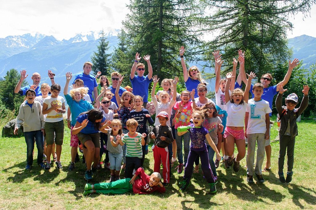 Group of children outdoors at Swiss summer camp