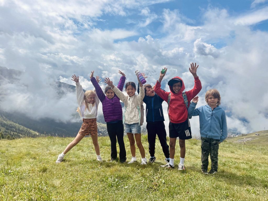 Verbier summer camp kids outside in Swiss mountains